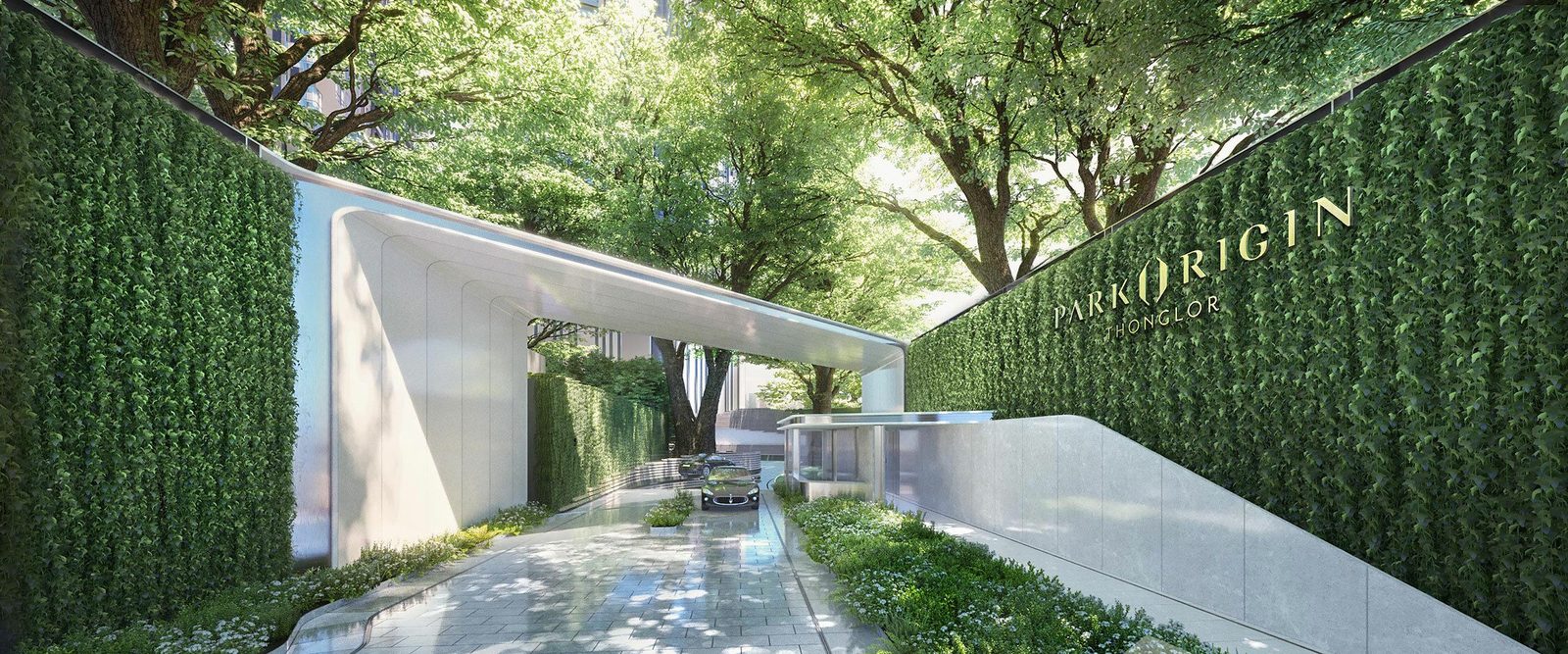 Park Origin Thonglor — green entrance alley to the towers