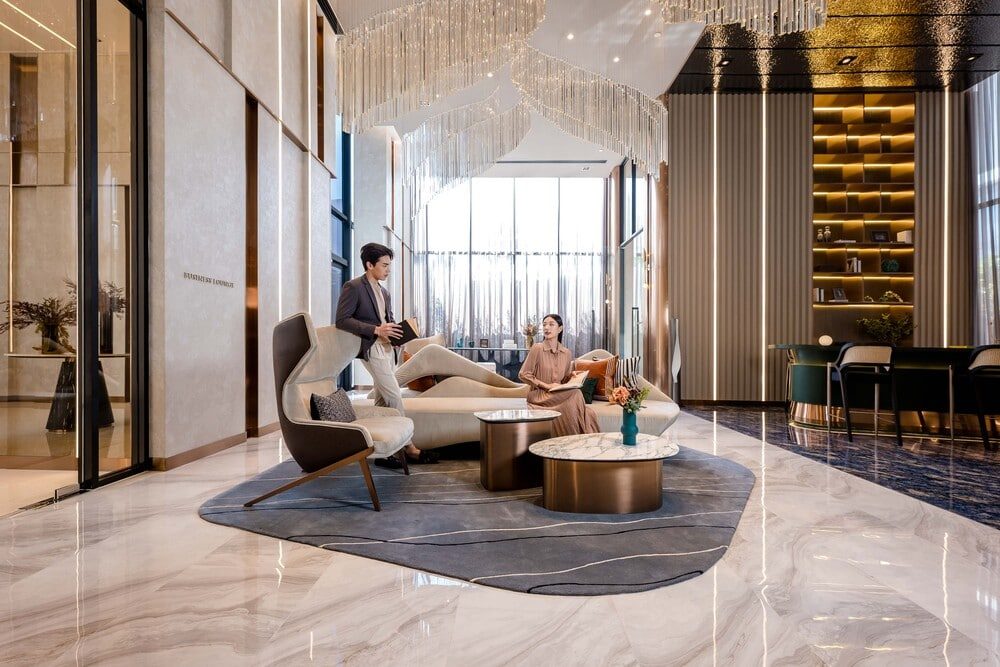 Park Origin Thonglor — lounge with marble floors and a crystal chandelier